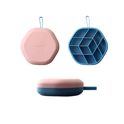 Silicone 12 cavity hexagon ice cube tray with silicone cover in blue, on a countertop