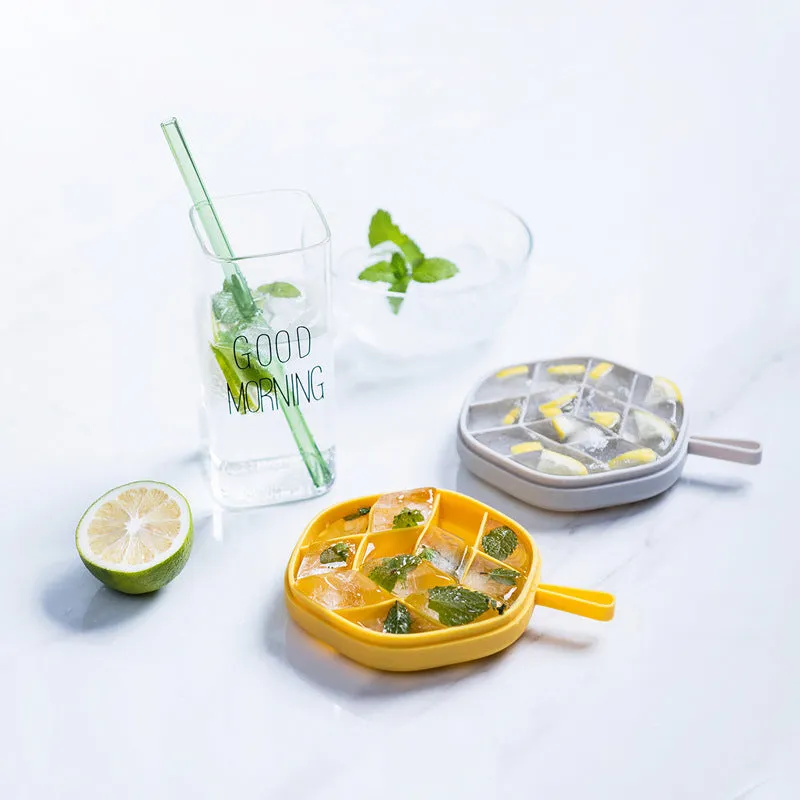Silicone 12 cavity hexagon ice cube tray with silicone cover in blue, on a countertop