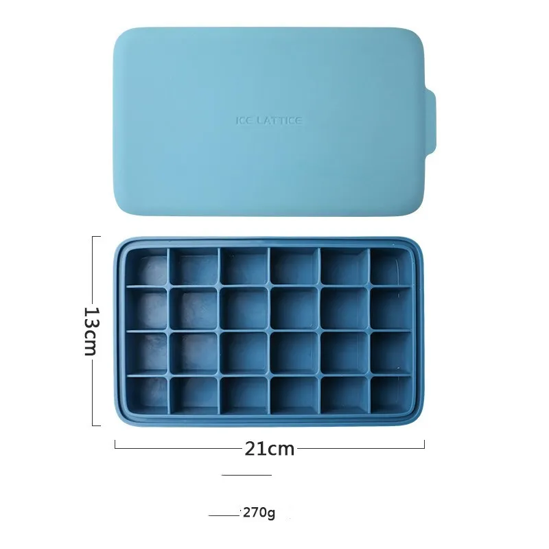 Silicone 12 cavity hexagon ice cube tray with silicone cover in blue, on a countertop