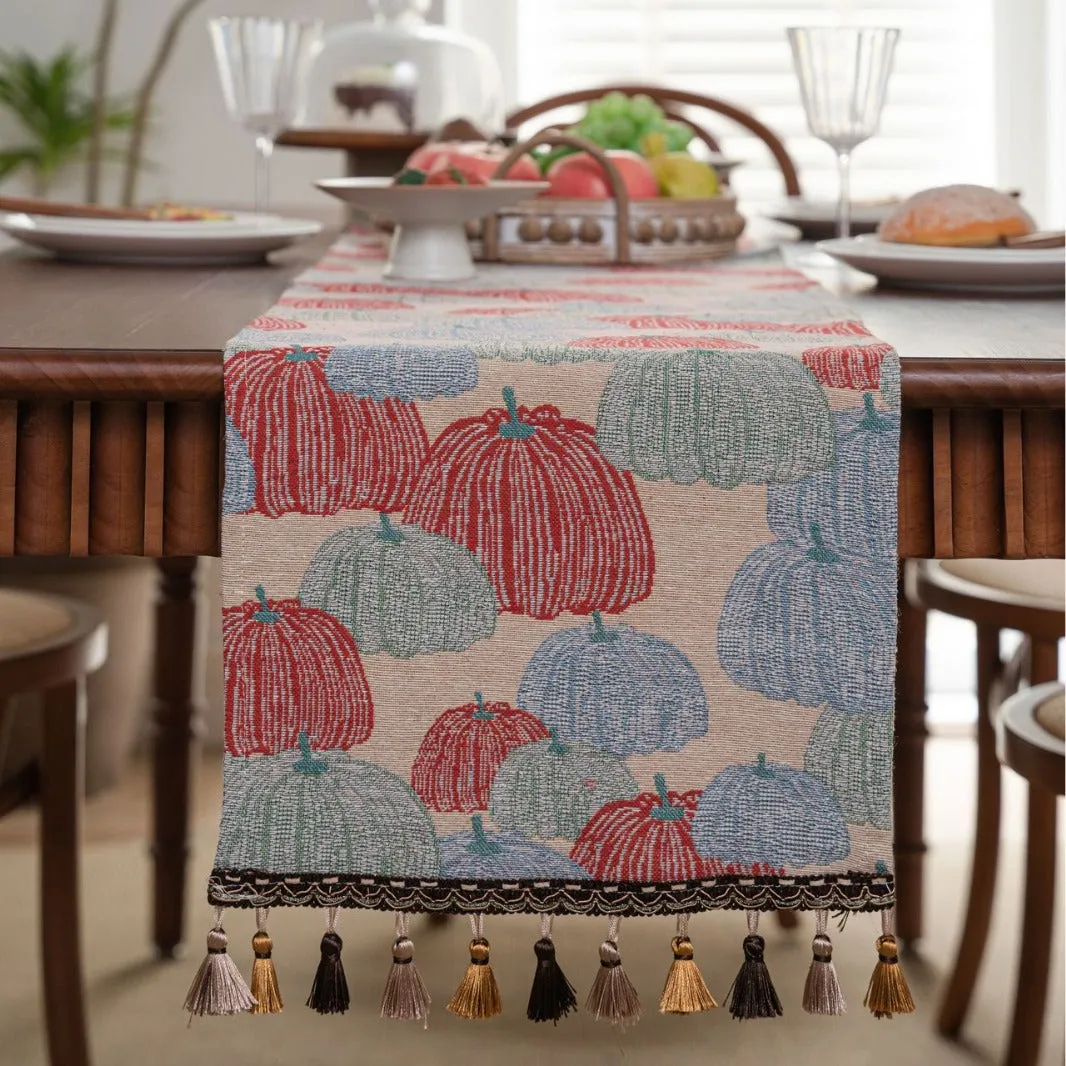 American-style beige jacquard table runner with long tassels and floral pattern on a dining table.