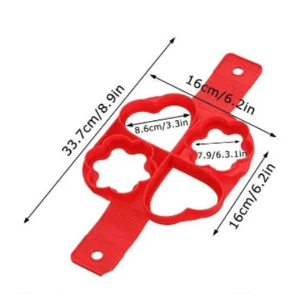 Red silicone nonstick egg pancake maker ring laid flat on a cooking surface