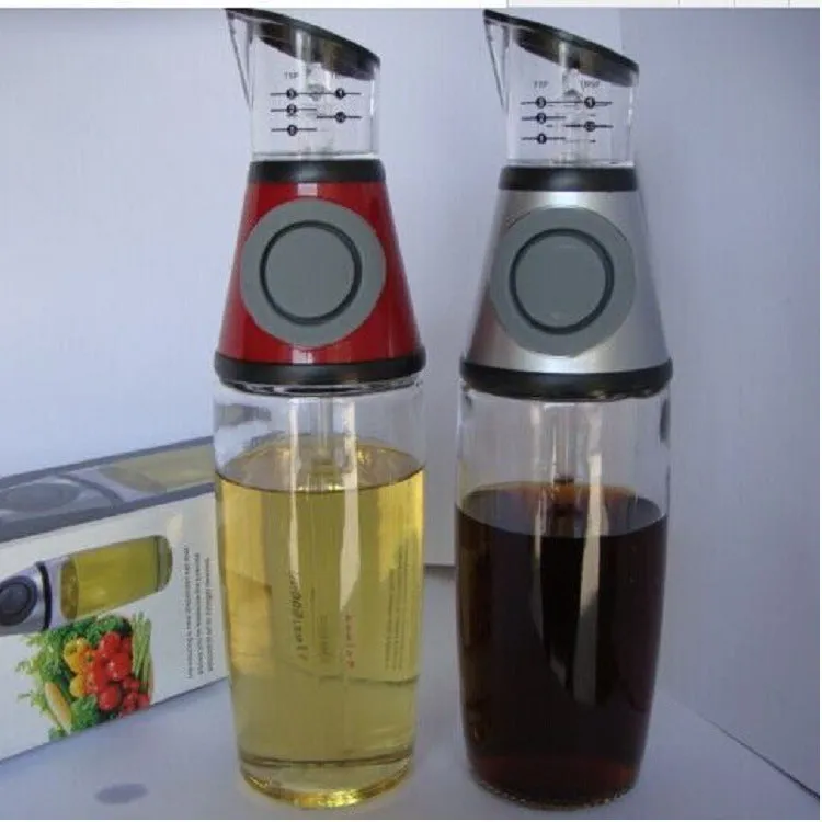 500ml high white glass measurable oil bottle with slim 8x28.5cm shape on kitchen countertop