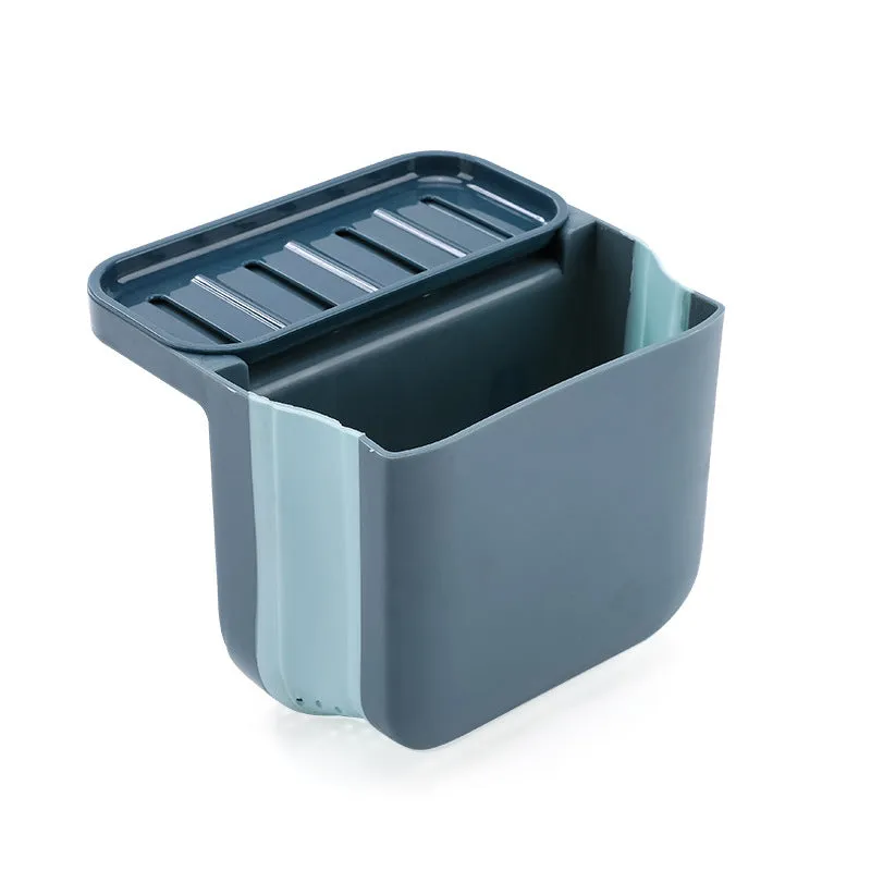 Foldable plastic sink drain basket with suction cup in grey, blue, and pink colour options