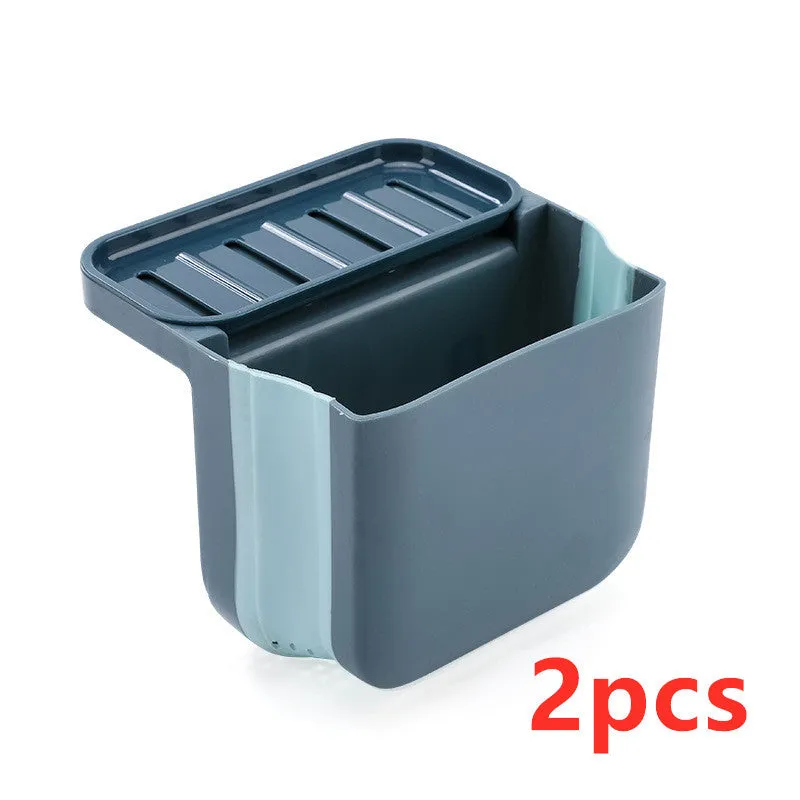 Foldable plastic sink drain basket with suction cup in grey, blue, and pink colour options