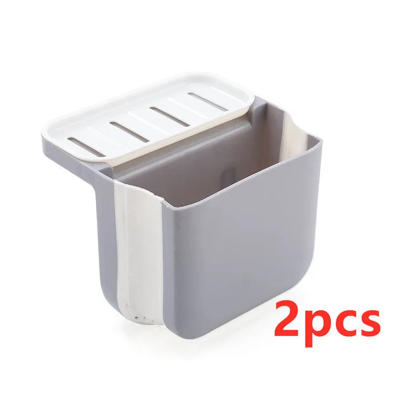 Foldable plastic sink drain basket with suction cup in grey, blue, and pink colour options