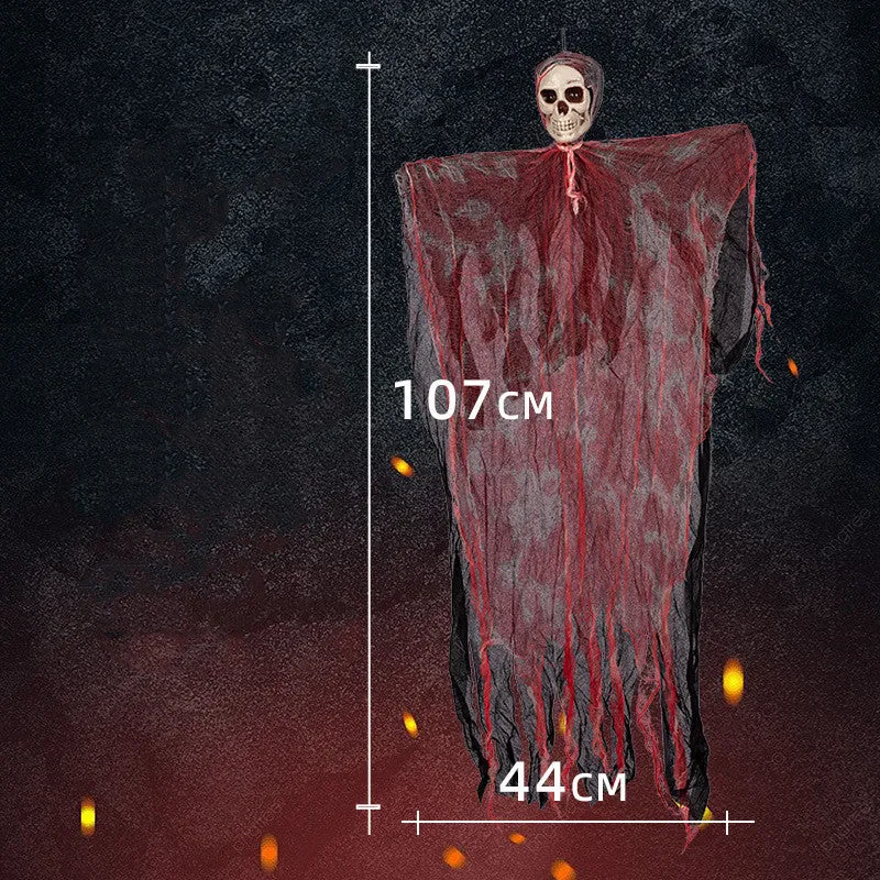 Halloween hanging ghost pendant with dyed blood effect skull decoration on a tree branch