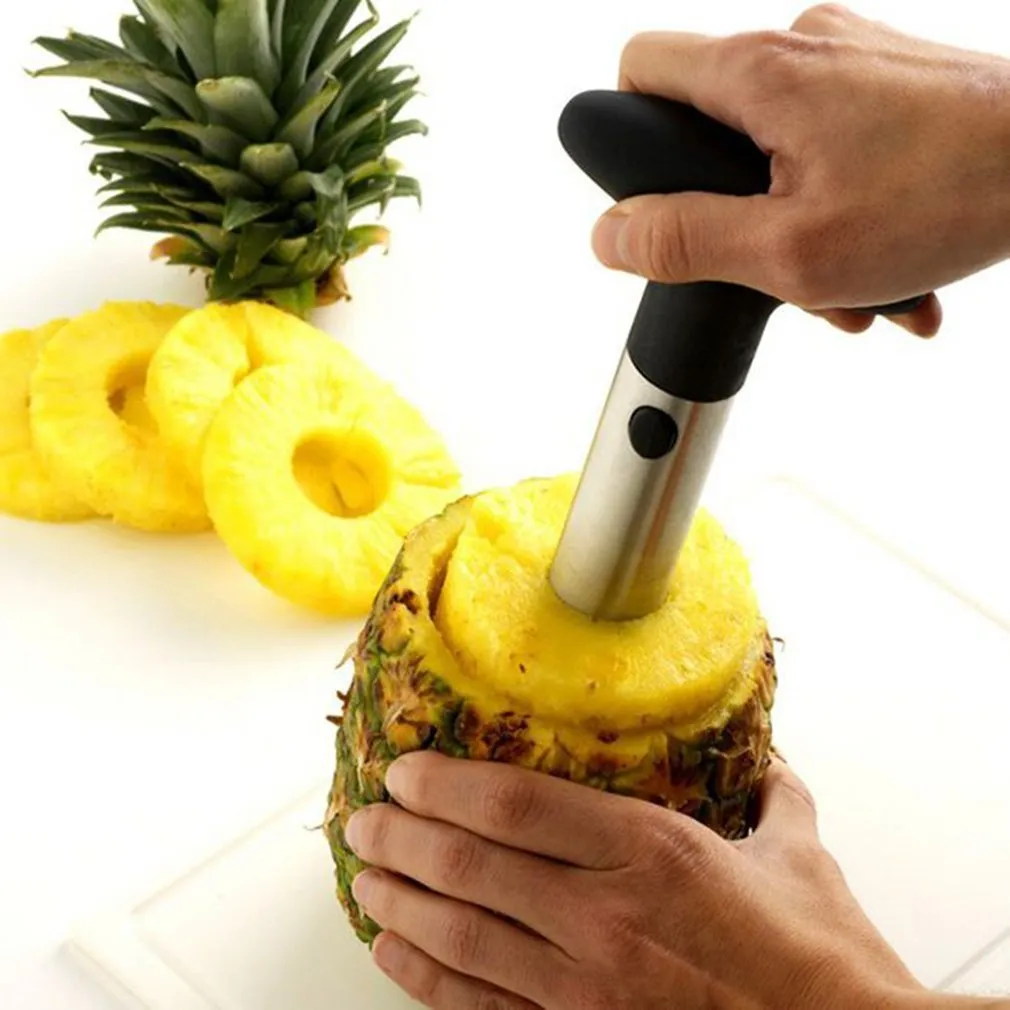 Stainless steel pineapple peeler with ergonomic handle and sawtooth blade on a countertop