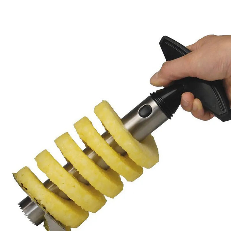 Stainless steel pineapple peeler with ergonomic handle and sawtooth blade on a countertop