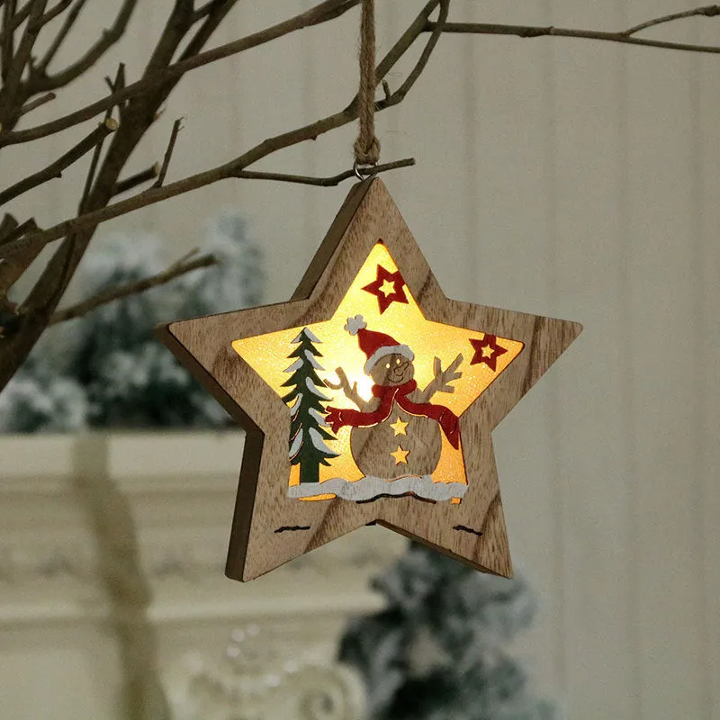 Set of four laser-cut wooden Christmas tree-shaped decorations including old man, snowman, deer, and five-star snowman in polychromatic colours