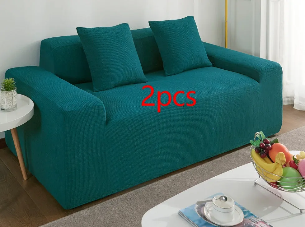 Waterproof polar fleece solid colour sofa slipcover with elastic bottom fitted on a 3-seat sofa in beige colour