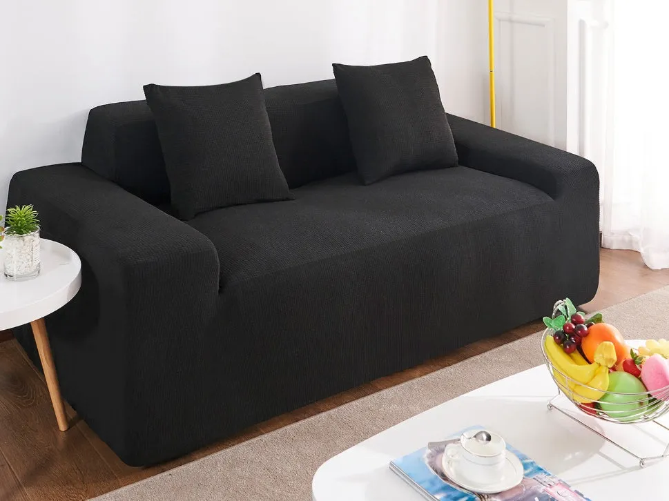 Waterproof polar fleece solid colour sofa slipcover with elastic bottom fitted on a 3-seat sofa in beige colour
