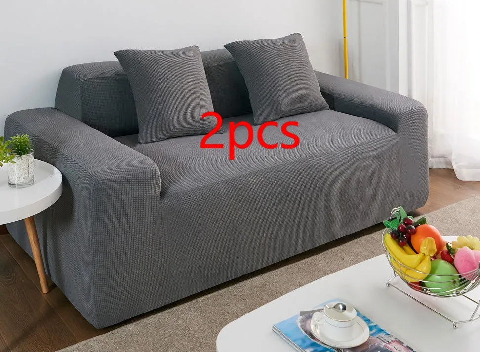 Waterproof polar fleece solid colour sofa slipcover with elastic bottom fitted on a 3-seat sofa in beige colour