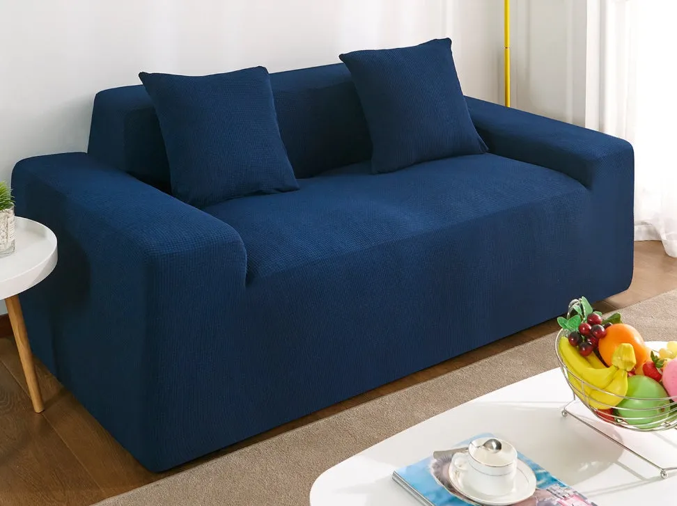 Waterproof polar fleece solid colour sofa slipcover with elastic bottom fitted on a 3-seat sofa in beige colour