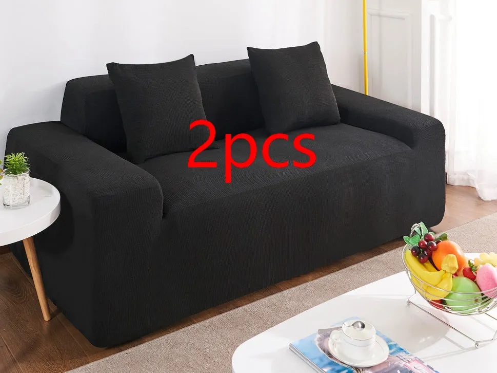 Waterproof polar fleece solid colour sofa slipcover with elastic bottom fitted on a 3-seat sofa in beige colour