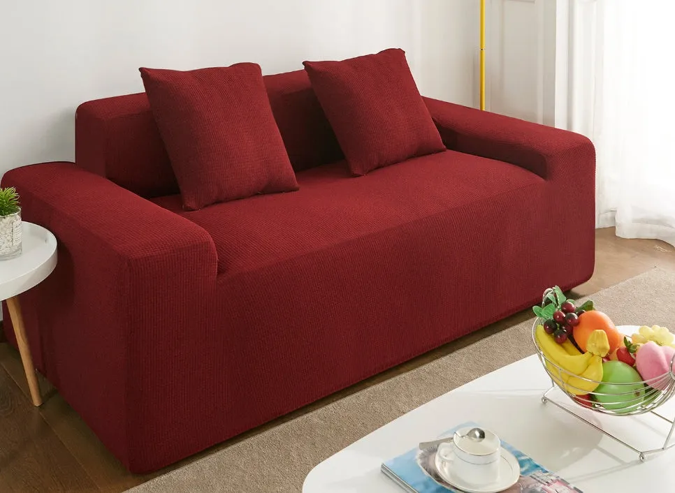 Waterproof polar fleece solid colour sofa slipcover with elastic bottom fitted on a 3-seat sofa in beige colour