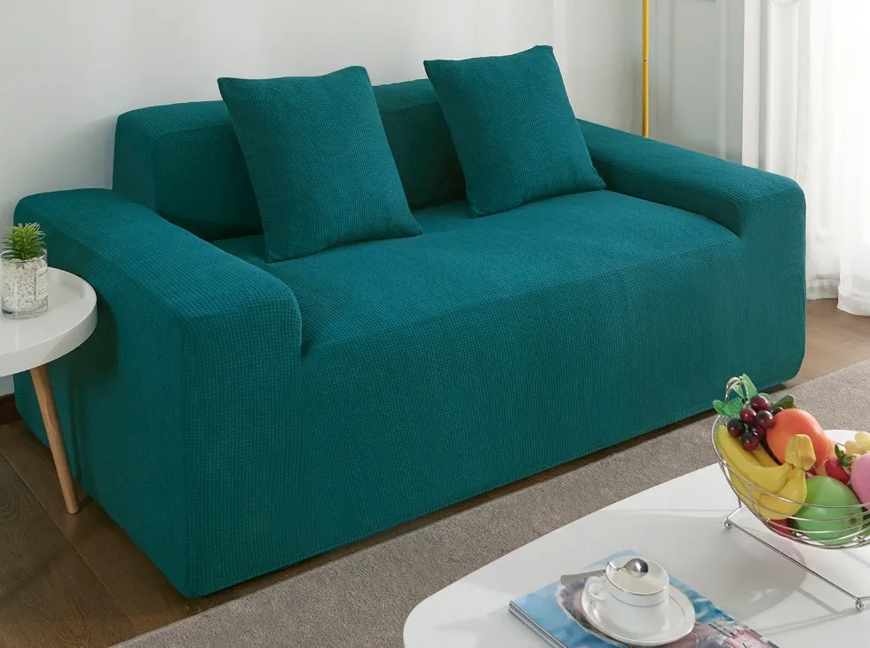 Waterproof polar fleece solid colour sofa slipcover with elastic bottom fitted on a 3-seat sofa in beige colour