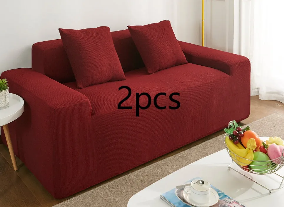 Waterproof polar fleece solid colour sofa slipcover with elastic bottom fitted on a 3-seat sofa in beige colour