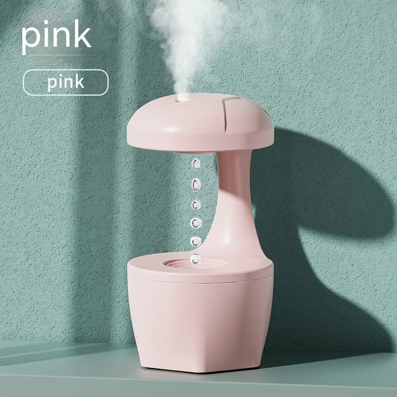 Suspended anti-gravity humidifier in white with USB cable, column shape, and ultrasonic mist output