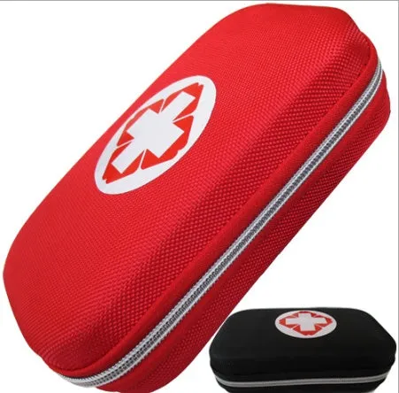 Red plastic survival medical kit emergency storage box with 18 first aid pieces including scissors and bandages