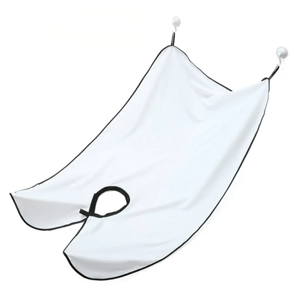 Polyester taff shaving apron with suction cup and tray table, 110x70cm, in black and white