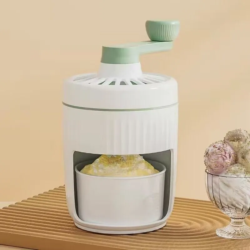 Hand-cranked ice shaving machine in green and orange, compact portable snow cone maker with ergonomic handle and removable ice box.