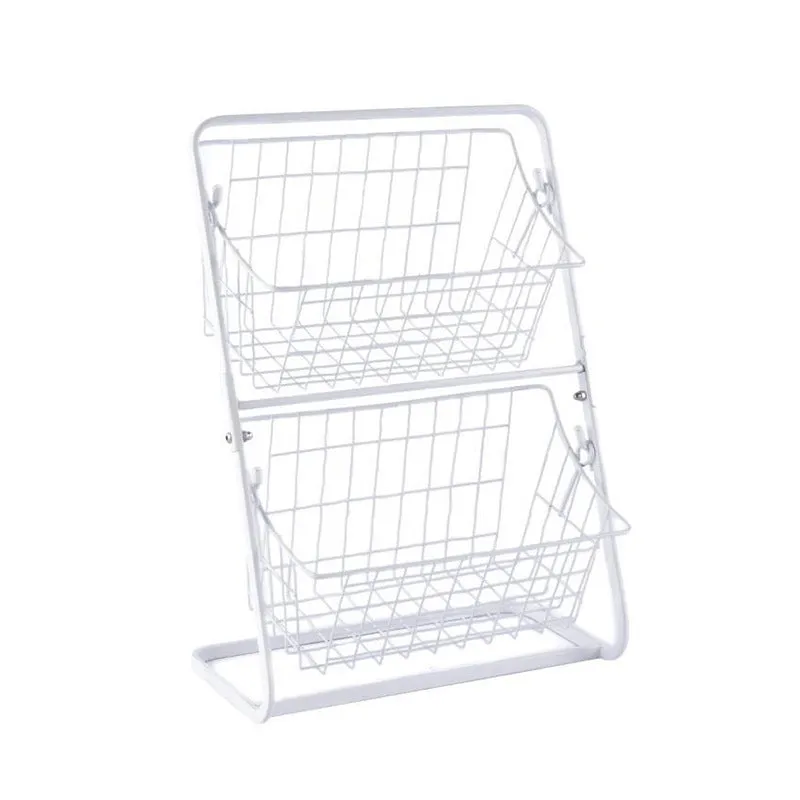 Two-tier black stainless steel kitchen storage rack with fruit and vegetables on a countertop