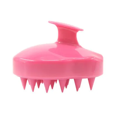 Silicone scalp massage brush with soft bristles in green colour on white background