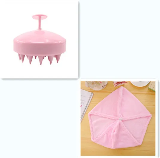 Silicone scalp massage brush with soft bristles in green colour on white background