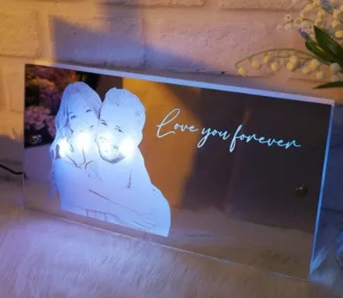 Personalised acrylic name mirror light with LED glow on wall in picture colour