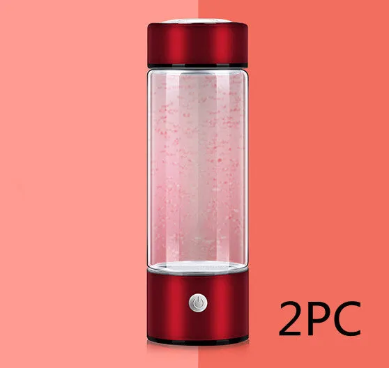 Portable hydrogen water cup with high borosilicate glass body and 304 stainless steel components, showing electrolysis bubbles.