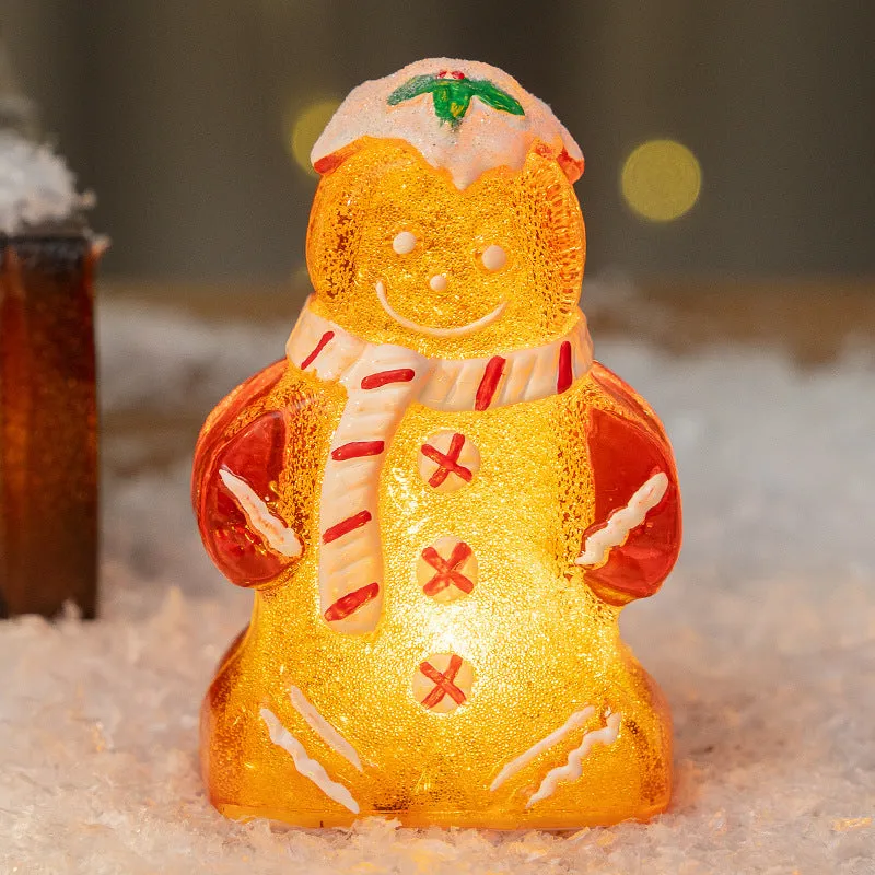 Glowing gingerbread man Christmas ornament with choice of scarf colours on Christmas tree branch