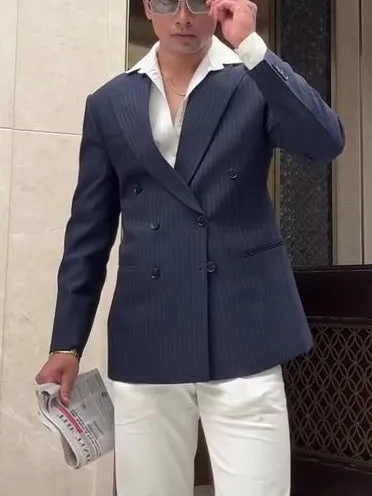 Men's classic stripe double-breasted blazer jacket on a hanger