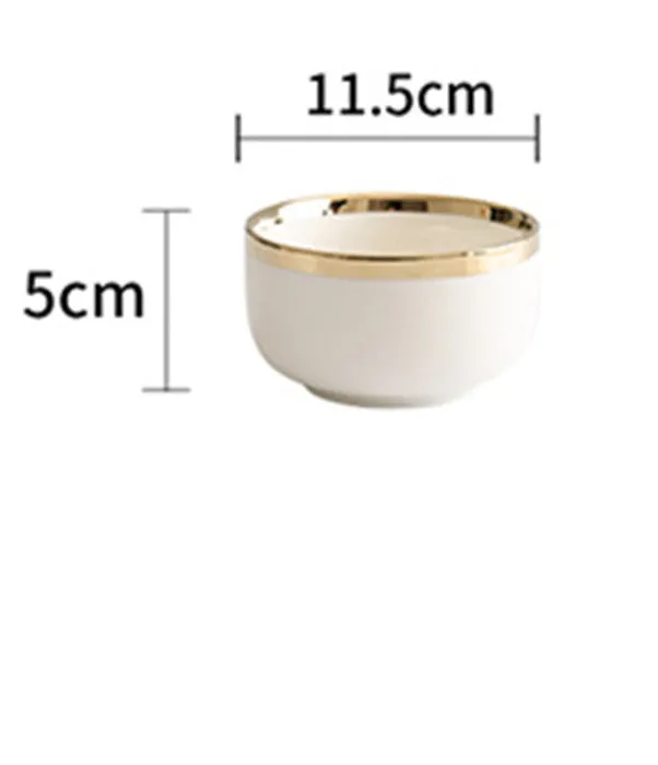 Porcelain bowls and plates with gold trim, American style, 4.5 inch bowl and 8 inch dish on table