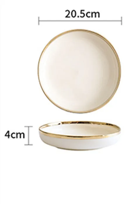 Porcelain bowls and plates with gold trim, American style, 4.5 inch bowl and 8 inch dish on table