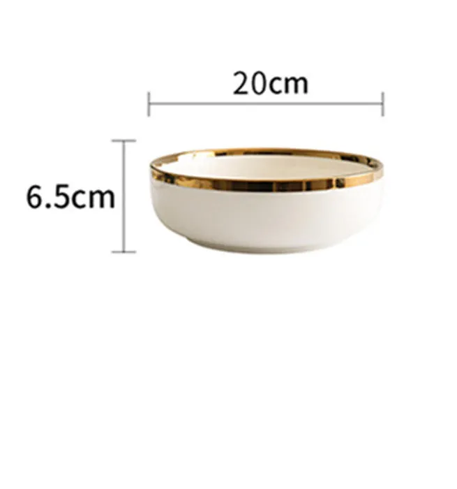 Porcelain bowls and plates with gold trim, American style, 4.5 inch bowl and 8 inch dish on table