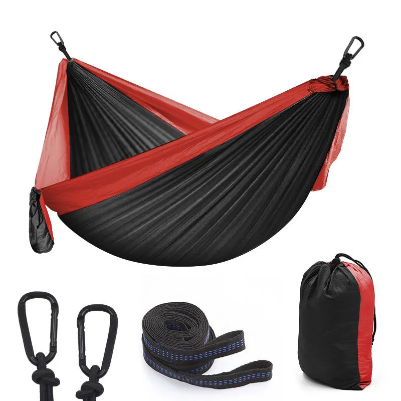 Double parachute hammock 300x200cm in 210T nylon with tree straps on a tree