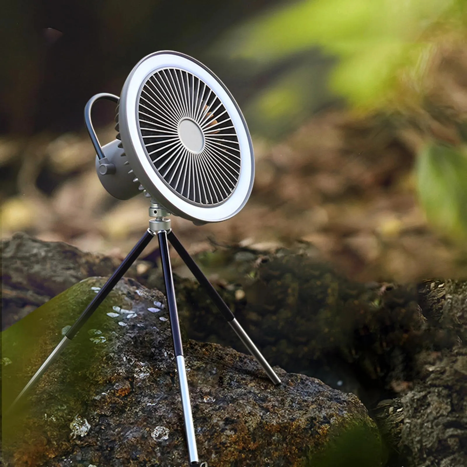 White USB rechargeable camping fan on aluminium tripod showing front view
