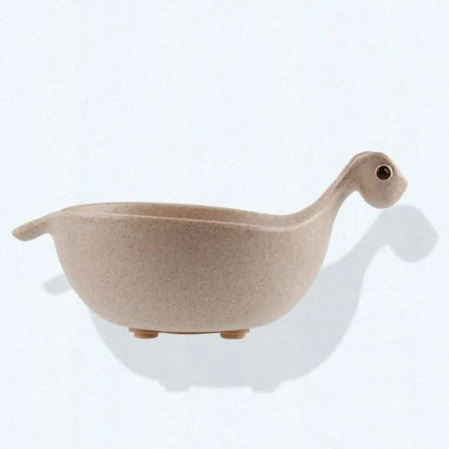 Cute tiny dinosaur bowl made of natural wheat straw fibre in pink, green, and beige colours, lightweight non-slip unbreakable design