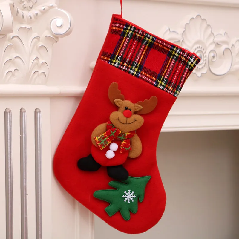 Hand-sewn cloth Christmas socks in sequin and letter styles, including a large red sock for gift bag use