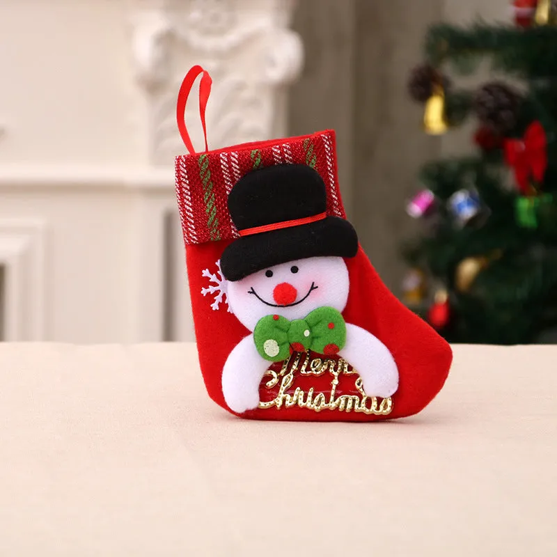 Hand-sewn cloth Christmas socks in sequin and letter styles, including a large red sock for gift bag use
