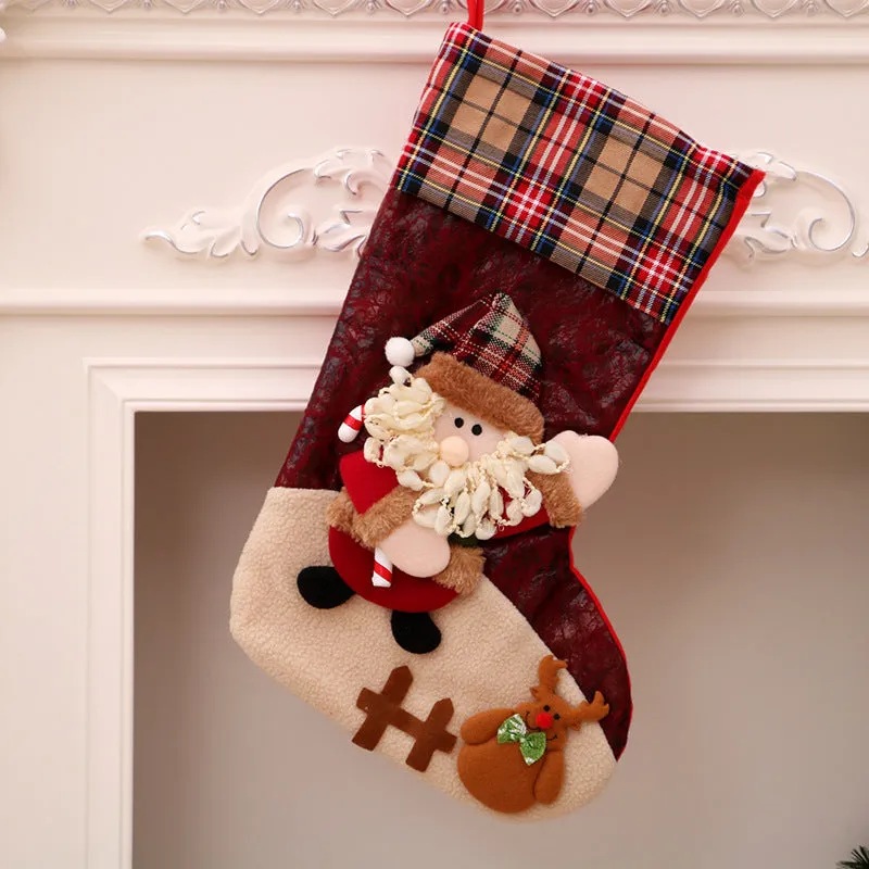 Hand-sewn cloth Christmas socks in sequin and letter styles, including a large red sock for gift bag use