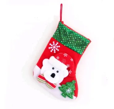 Hand-sewn cloth Christmas socks in sequin and letter styles, including a large red sock for gift bag use