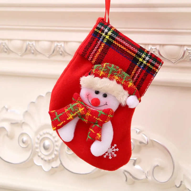 Hand-sewn cloth Christmas socks in sequin and letter styles, including a large red sock for gift bag use