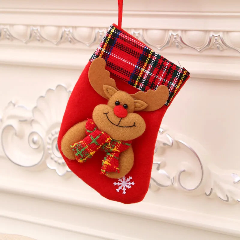 Hand-sewn cloth Christmas socks in sequin and letter styles, including a large red sock for gift bag use