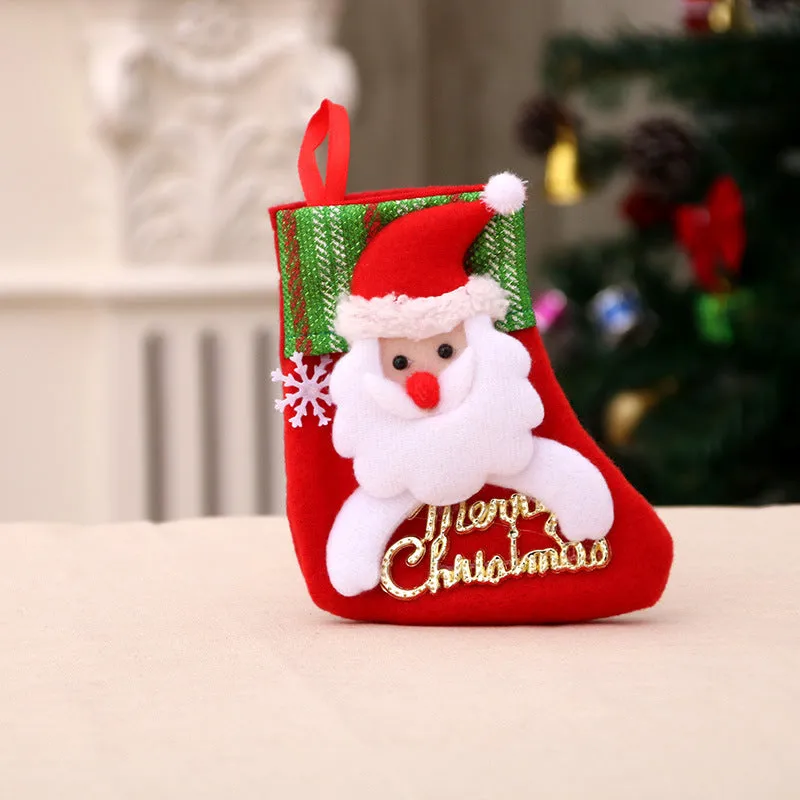 Hand-sewn cloth Christmas socks in sequin and letter styles, including a large red sock for gift bag use