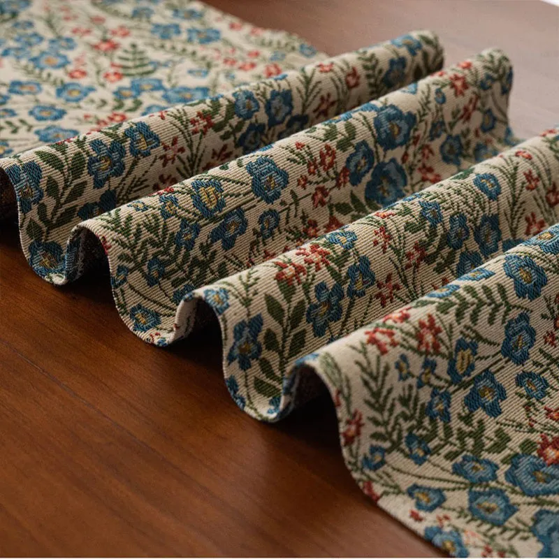 Nordic jacquard table runner with striped pattern and tassel fringe trim in dark blue colour