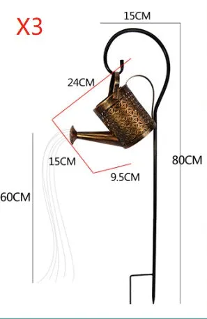Solar watering can garden lamp with hollow-out iron shower body and 36 warm white LED lights on copper wire, installed in grass