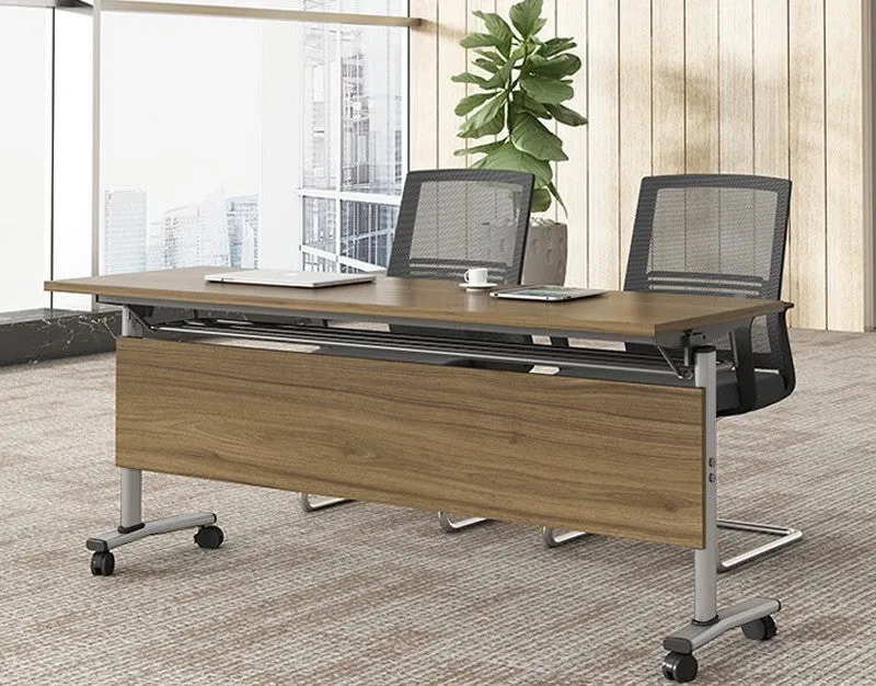 Black leather office chair with metal frame, armrests, and swivel base on a wooden floor