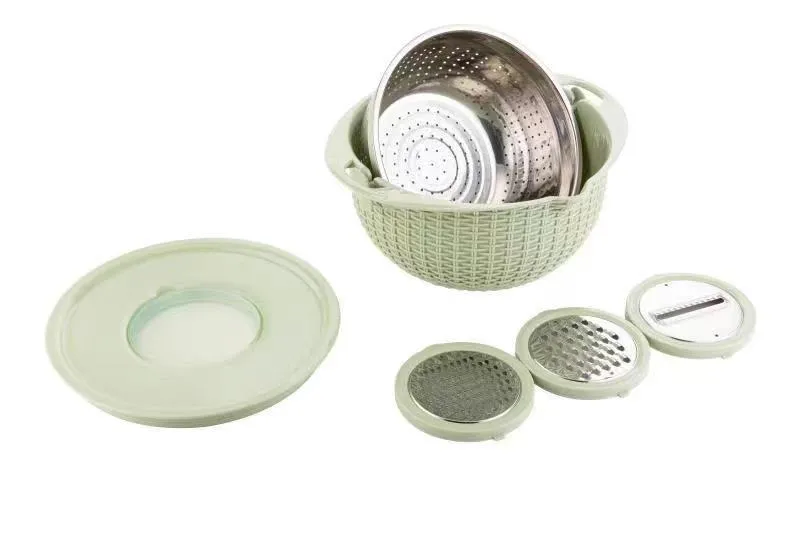Rotatable 4-in-1 kitchen draining basket with stainless steel blades in Nordic colour on a countertop