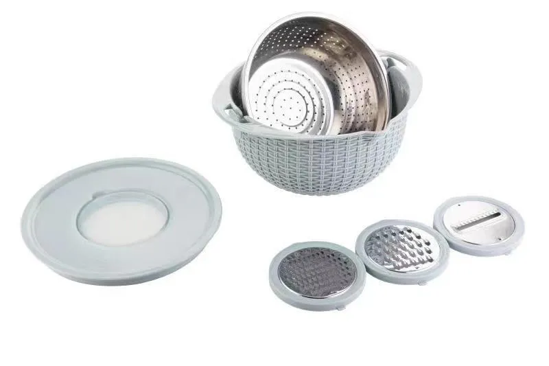Rotatable 4-in-1 kitchen draining basket with stainless steel blades in Nordic colour on a countertop